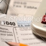 stock-photo-16062764-close-up-of-irs-form-1040